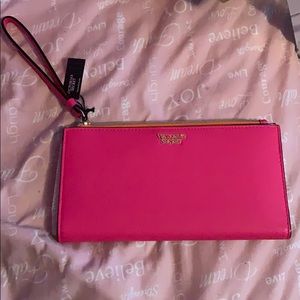 Brand new wrist lit clutch